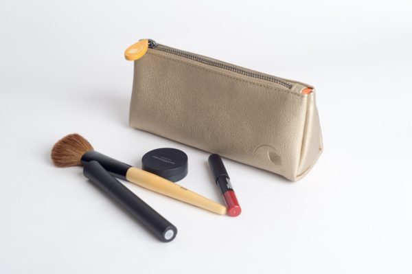 gold cosmetics bag and makeup pouch