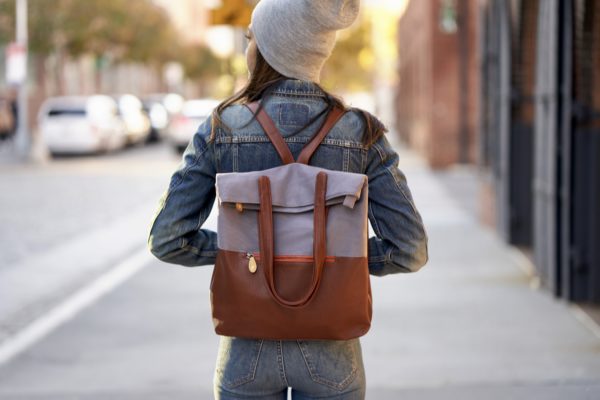 gray canvas backpack with vegan leather