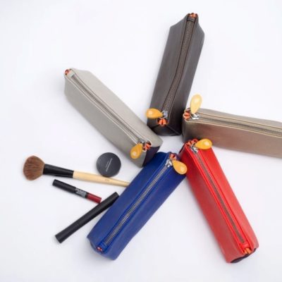 zipper makeup pouch and cosmetics bag in blue, gray, black metallic, red, and gold
