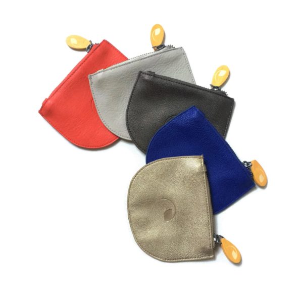 vegan leather wallet and purse in gold, blue, metallic black, gray, and coral red