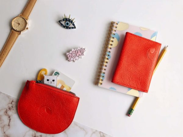 red credit card wallet and small purse